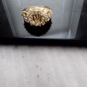 Gold plated ring with diamonds
